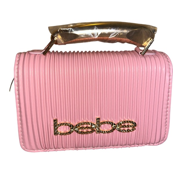 bebe Handbags - NWT Bebe pink accordion style top handle bag with a gold Crossbody chain
